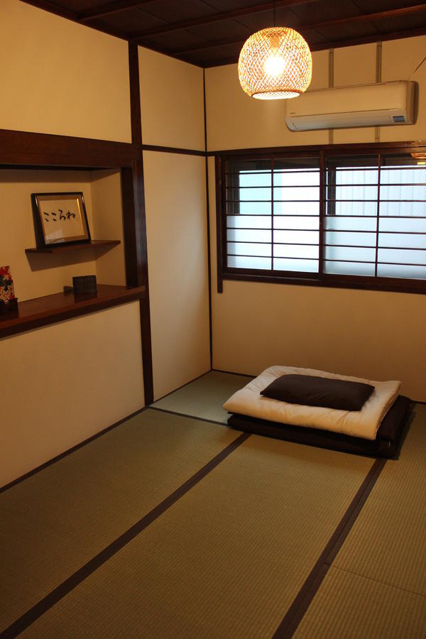 Tenma Itoya Guest House Oszaka Szoba fotó